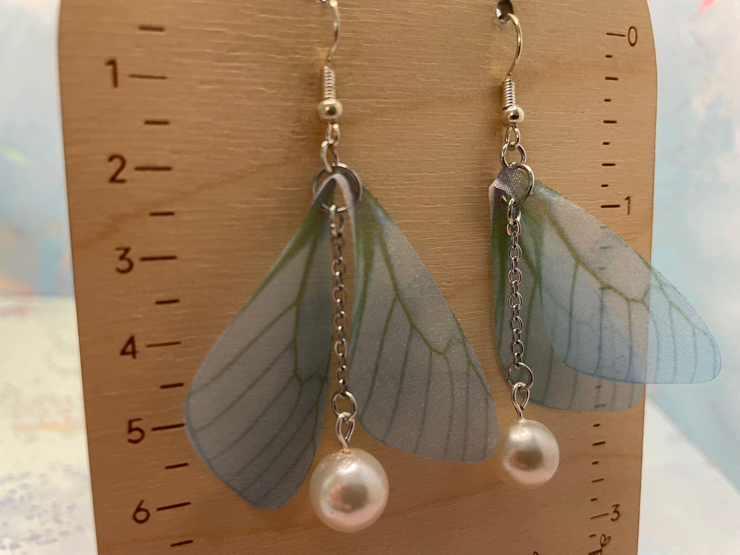 Boucles d’oreilles pendantes ailes de papillon avec billes