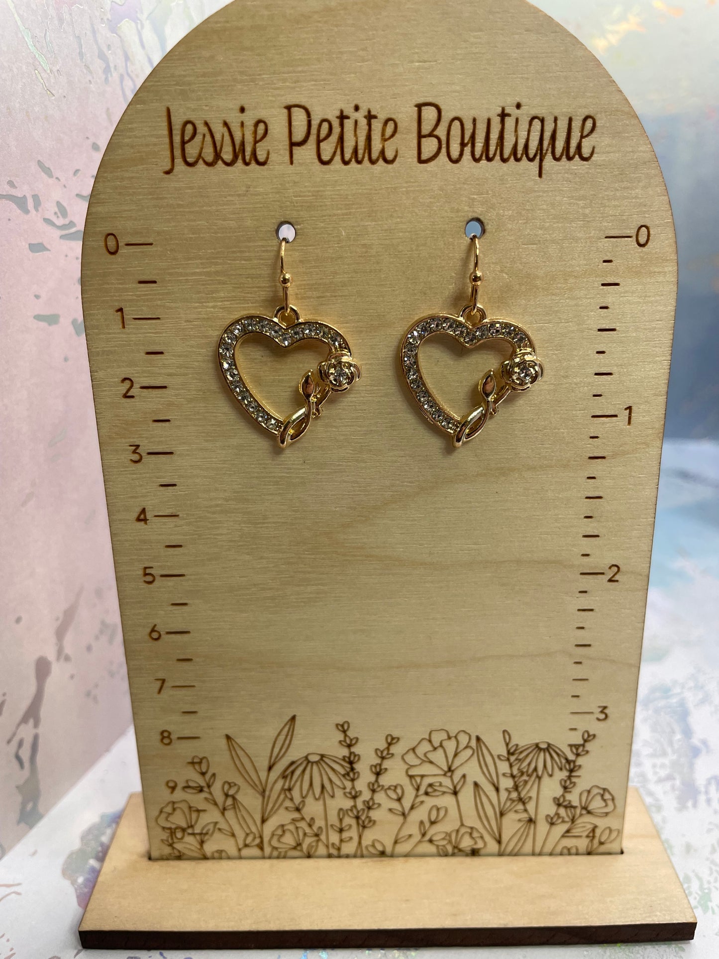 Boucles d'oreilles cœur en zircone avec rose dorée
