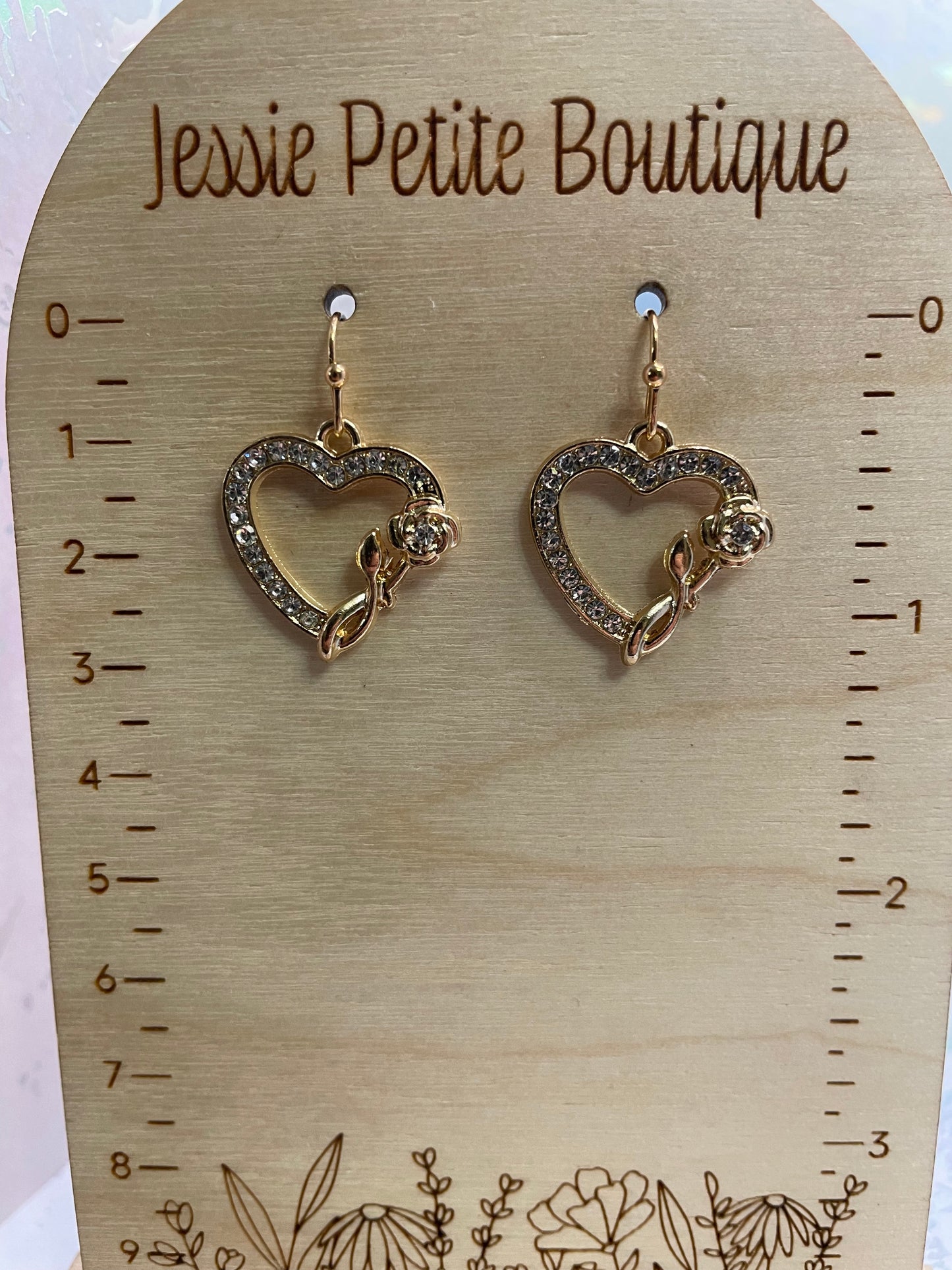 Boucles d'oreilles cœur en zircone avec rose dorée