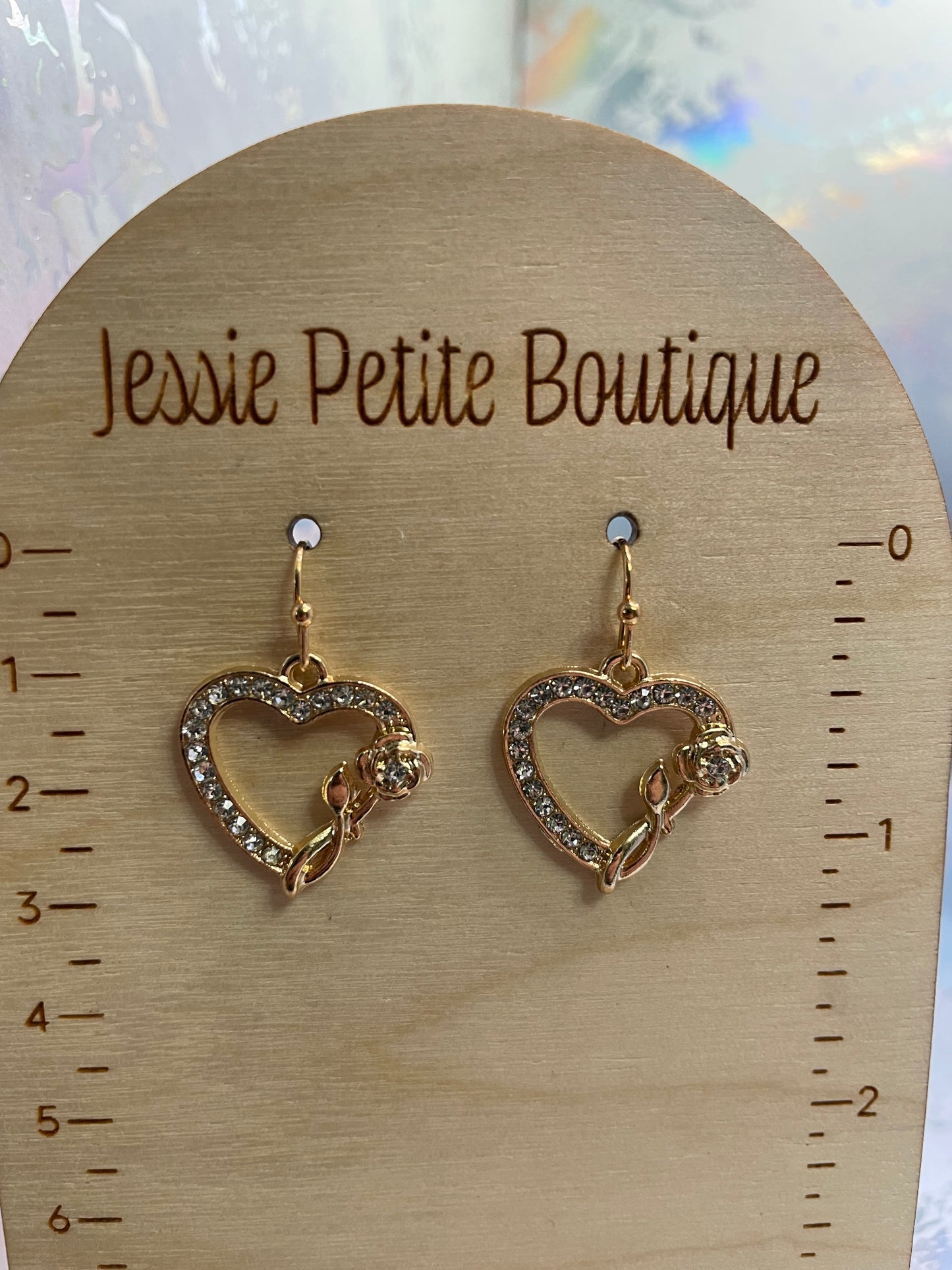 Boucles d'oreilles cœur en zircone avec rose dorée