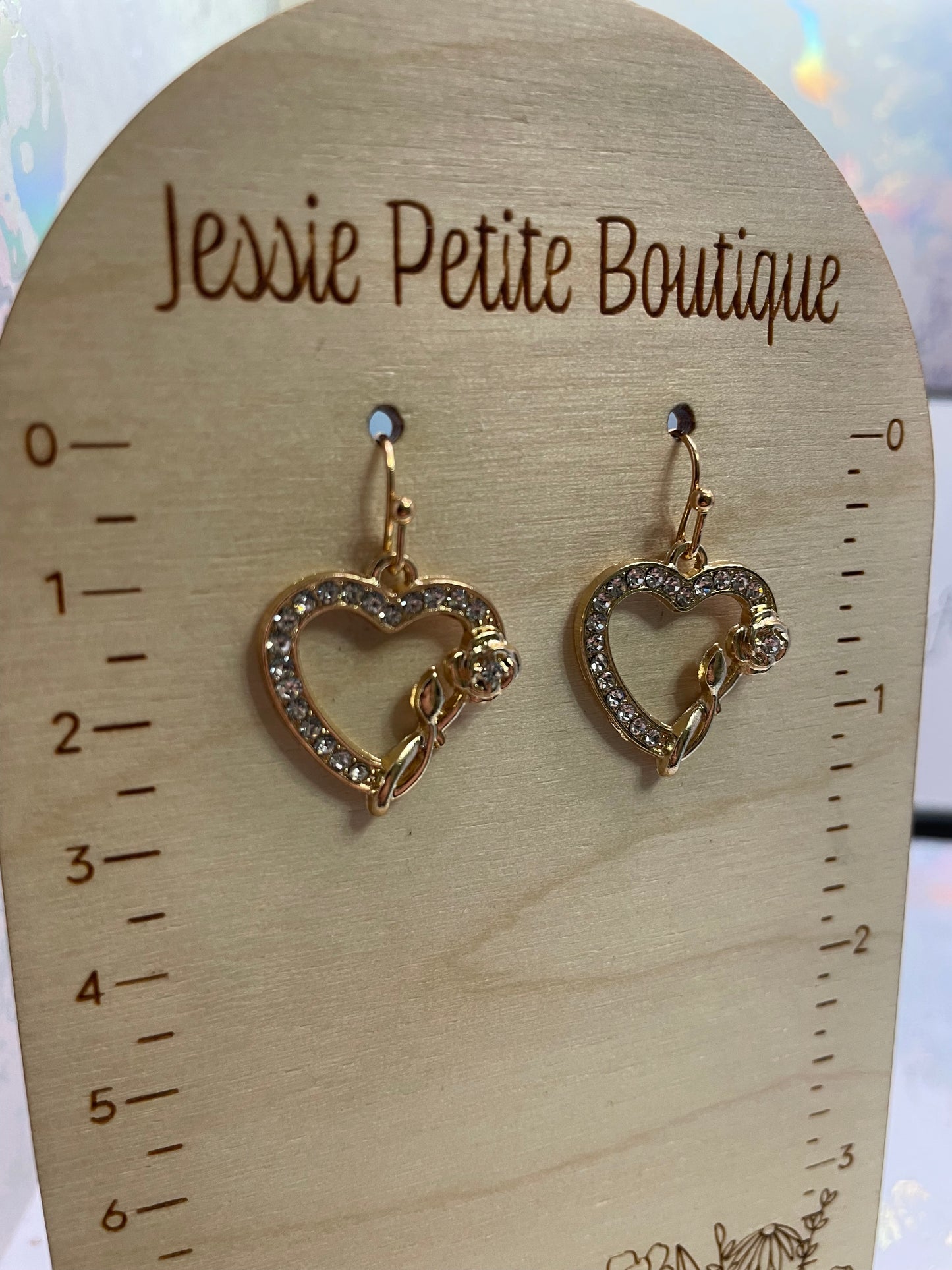 Boucles d'oreilles cœur en zircone avec rose dorée