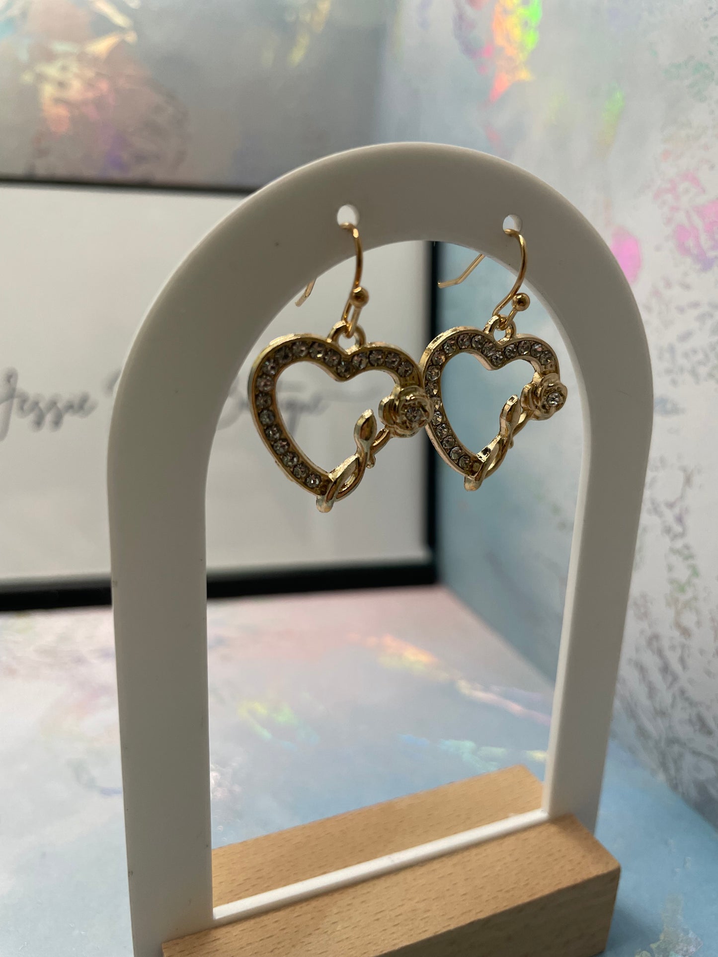 Boucles d'oreilles cœur en zircone avec rose dorée