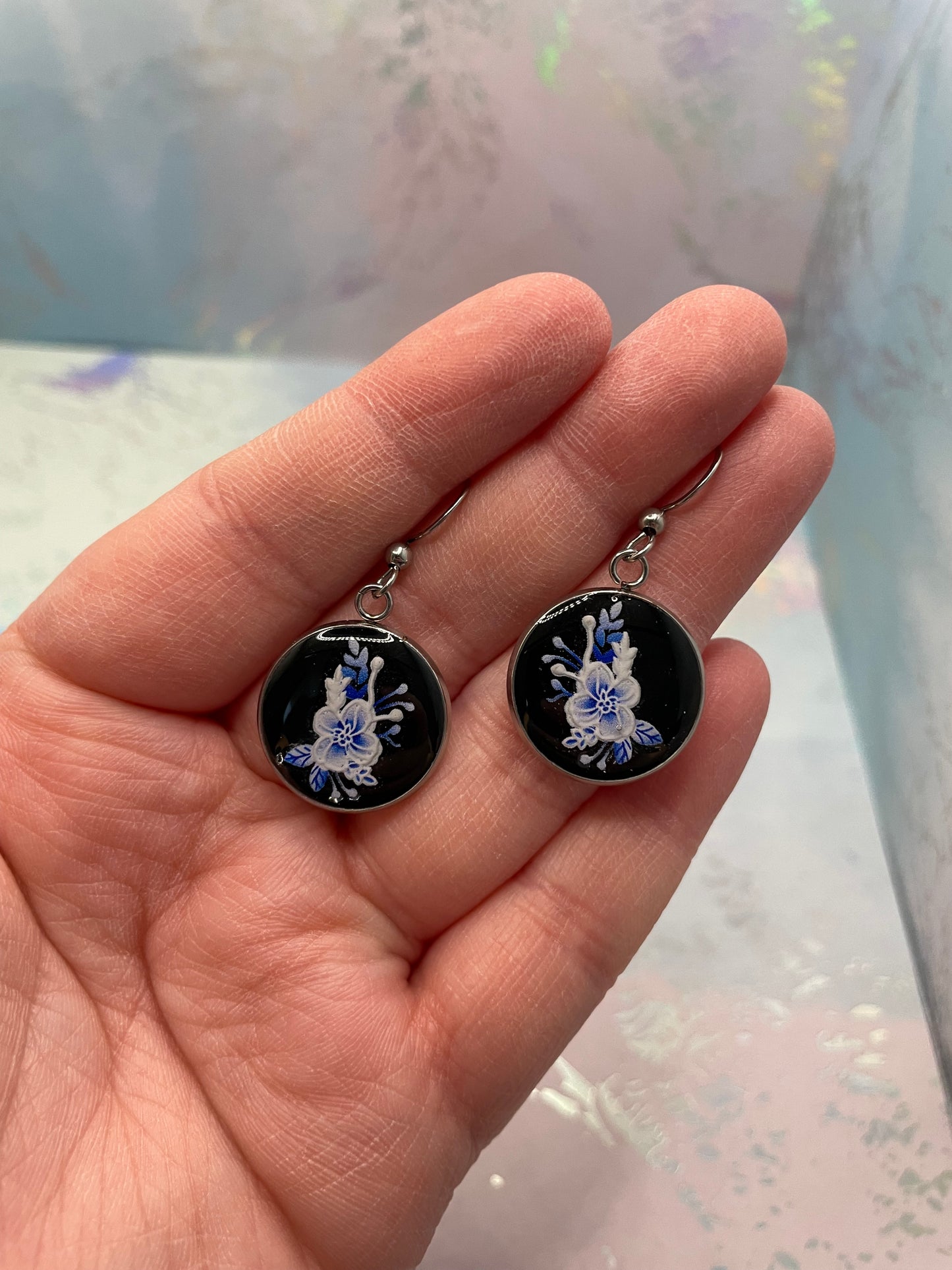 Round Blue Floral on Black Bezel Earrings-Stainless Steel