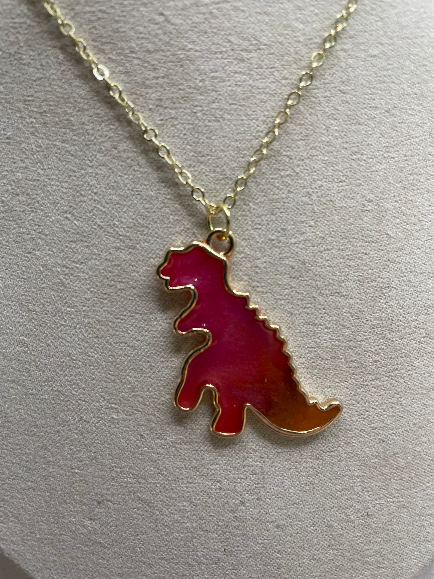 Collier dinosaure dégradé – orange à fuchsia