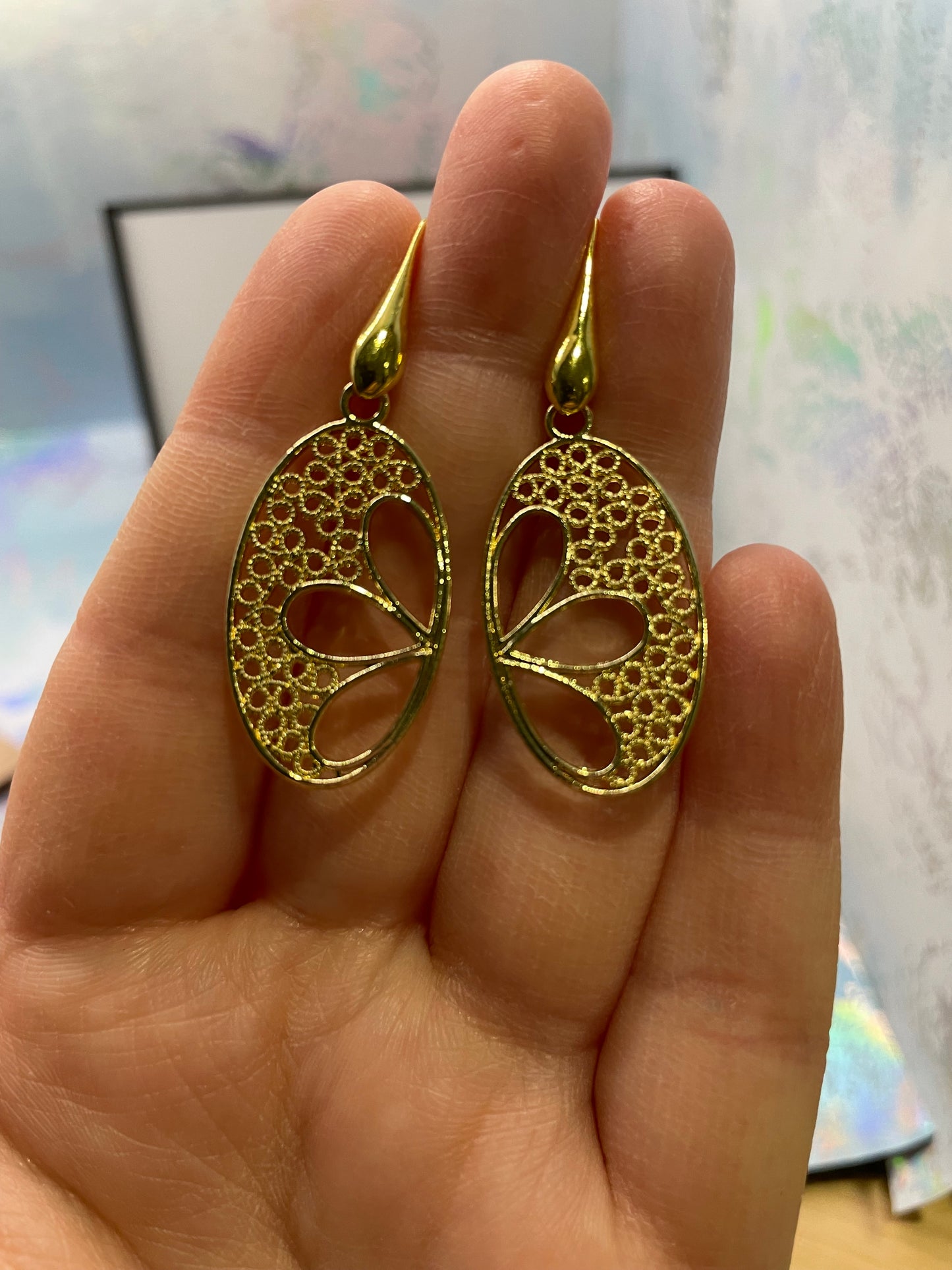Boucles d'oreilles fleurs oval en or 