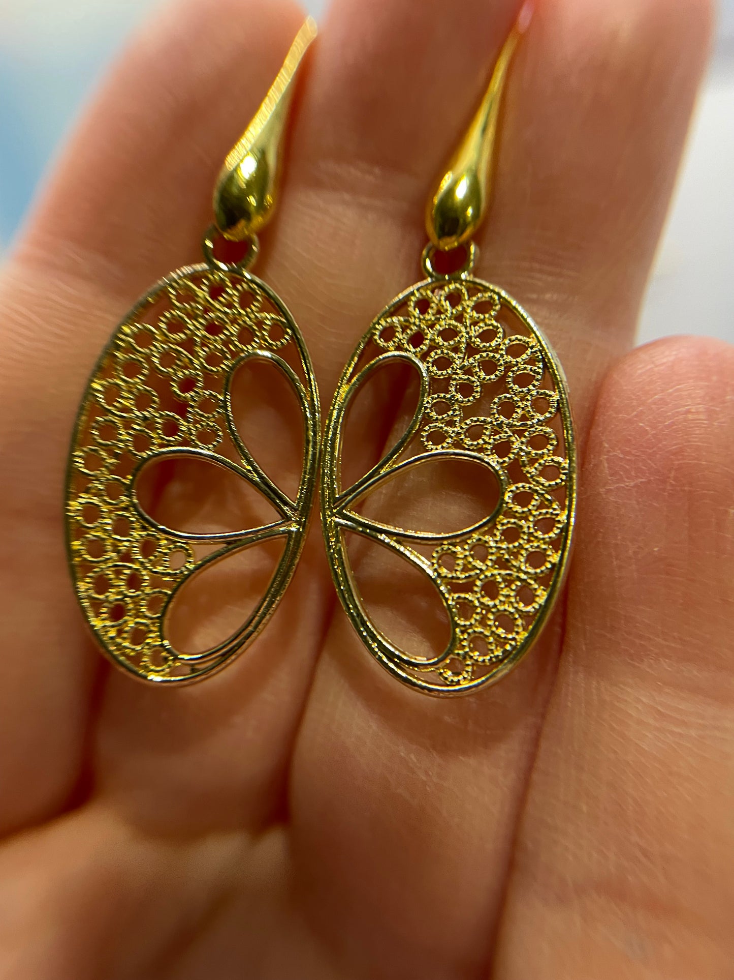 Boucles d'oreilles fleurs oval en or 