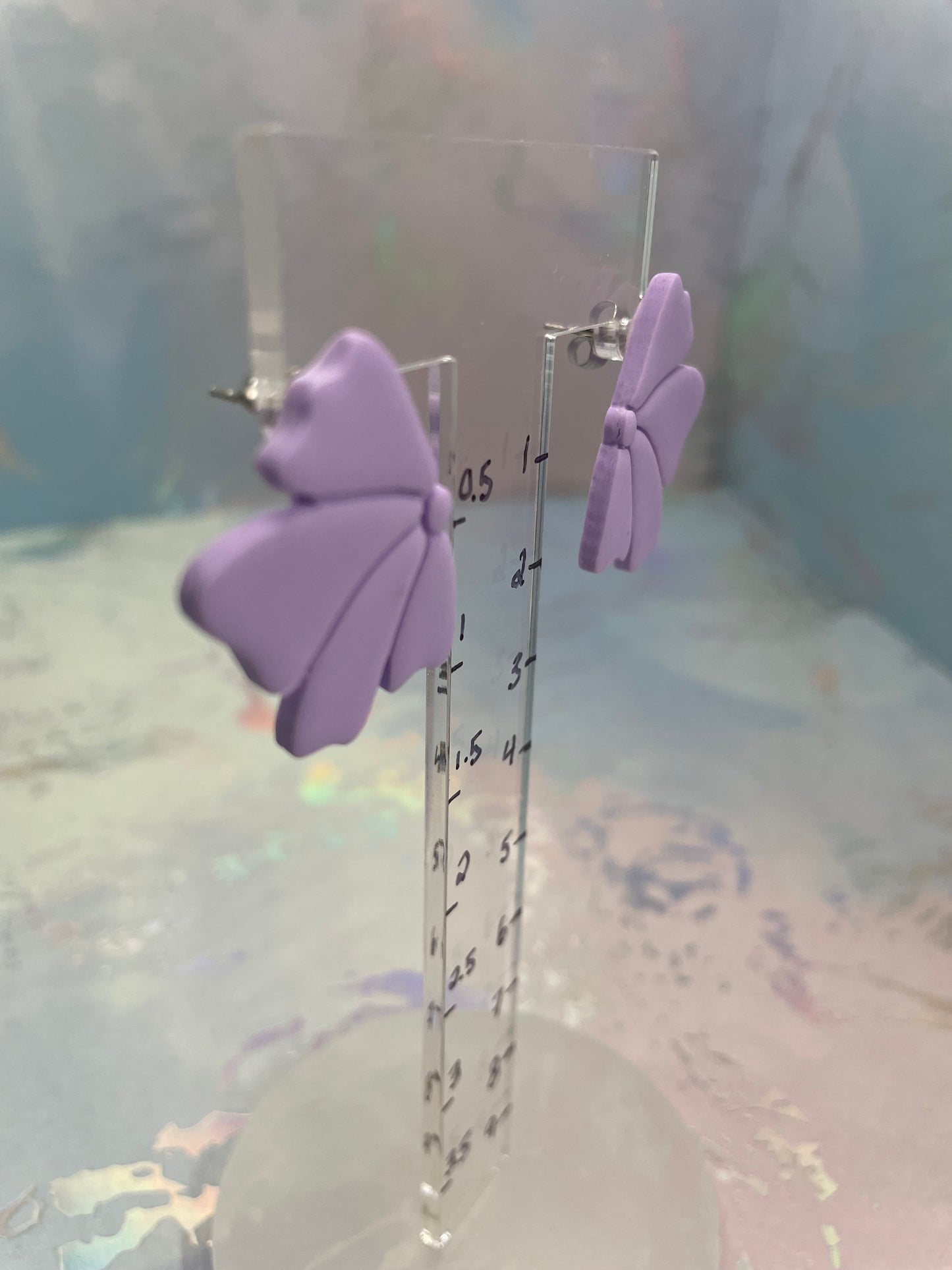 Bouton d’oreille fleur mauve