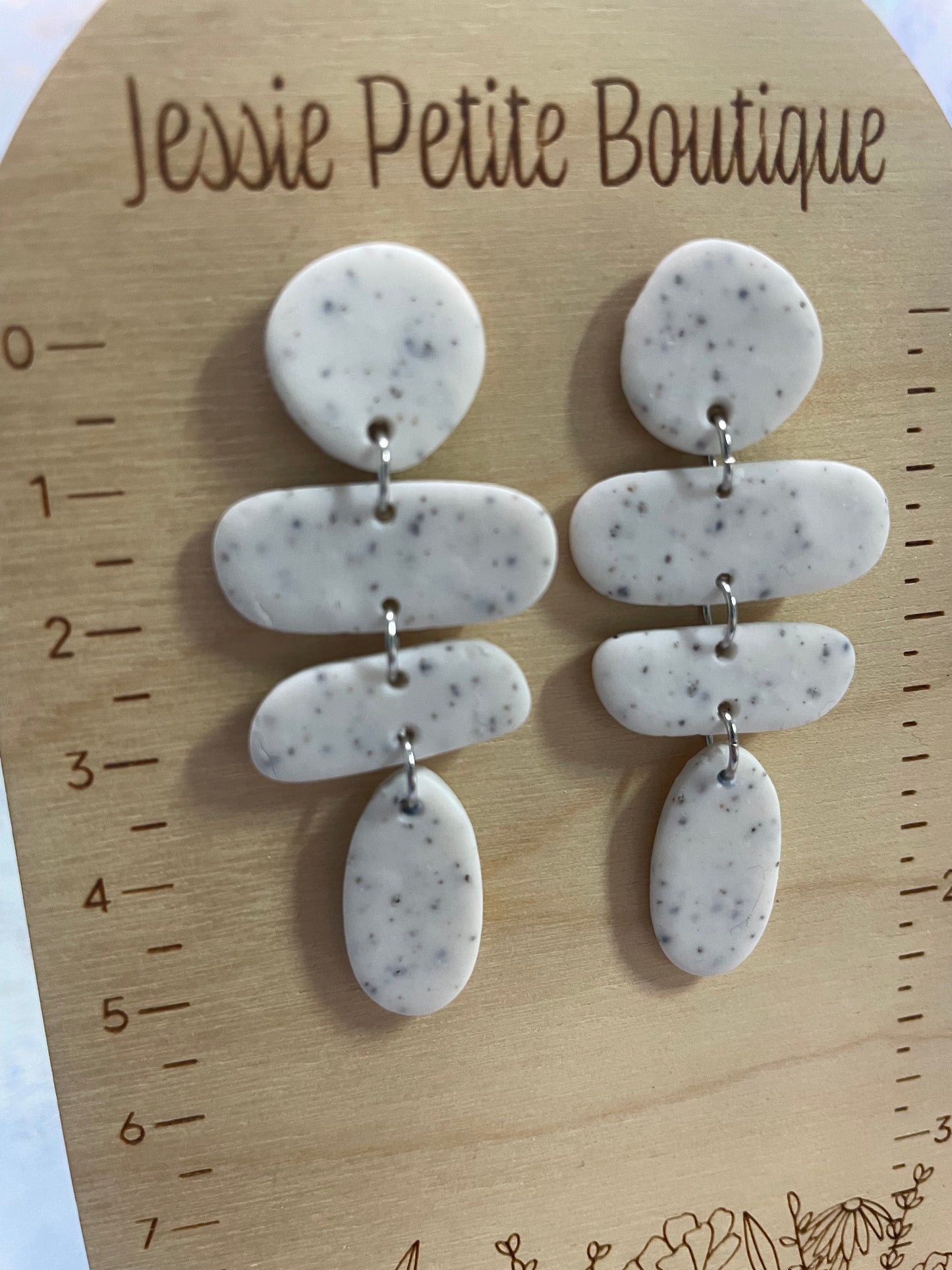 Boucles d’oreilles géométriques abstraites en argile polymère