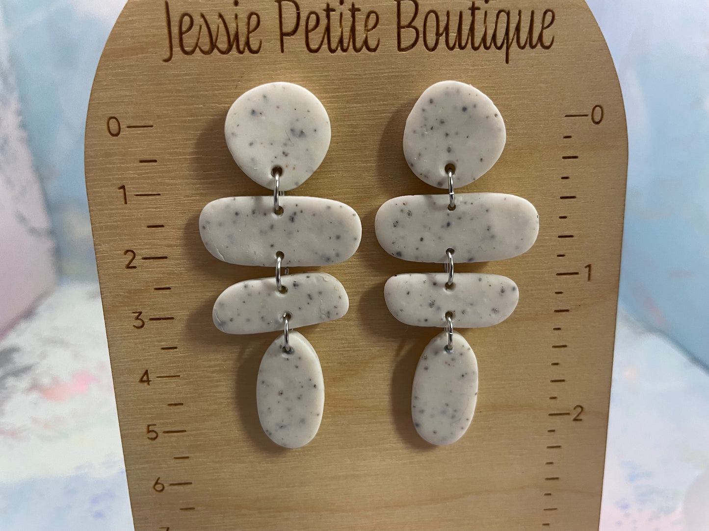 Boucles d’oreilles géométriques abstraites en argile polymère