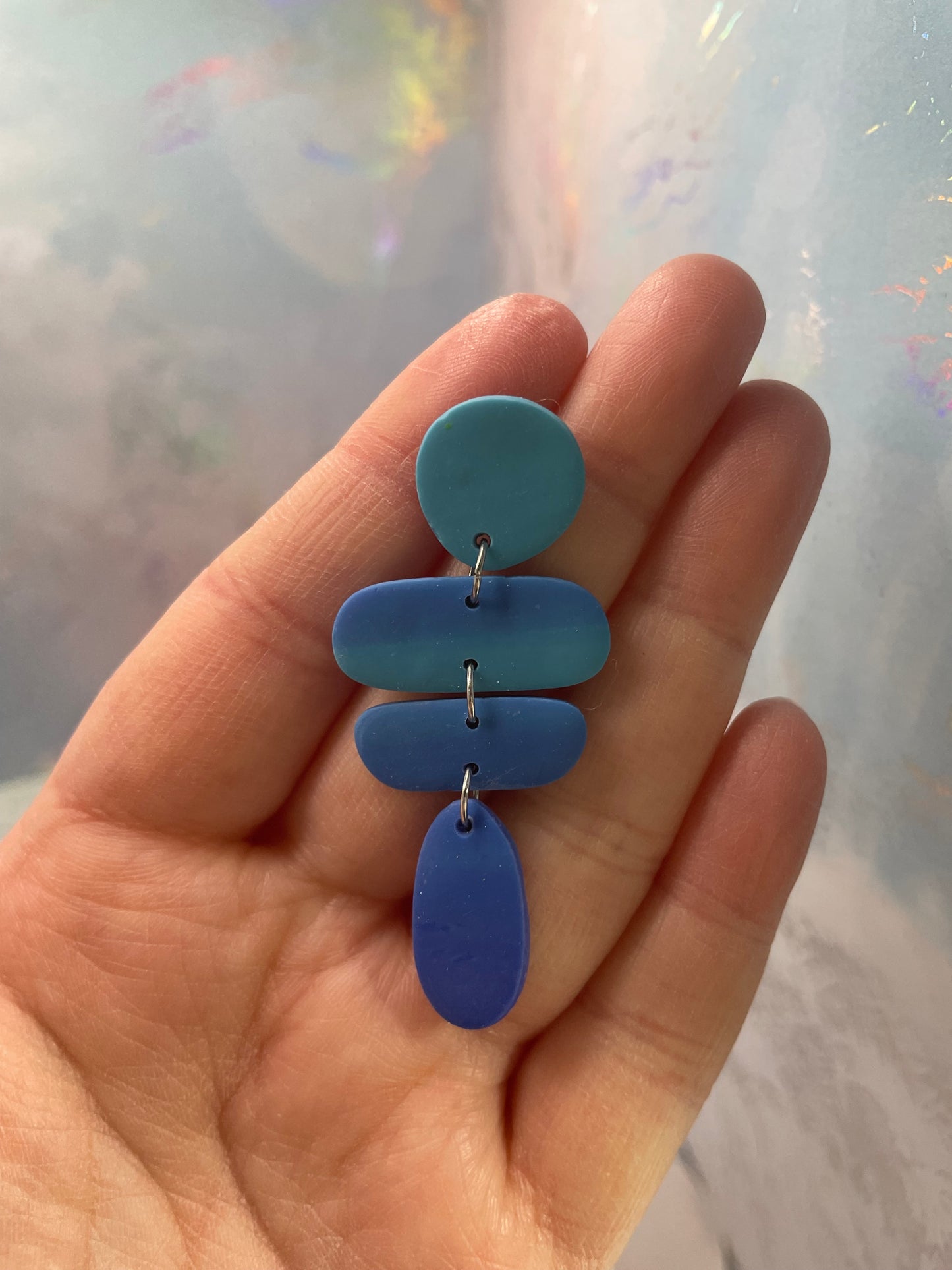 Boucles d’oreilles géométriques abstraites en argile polymère