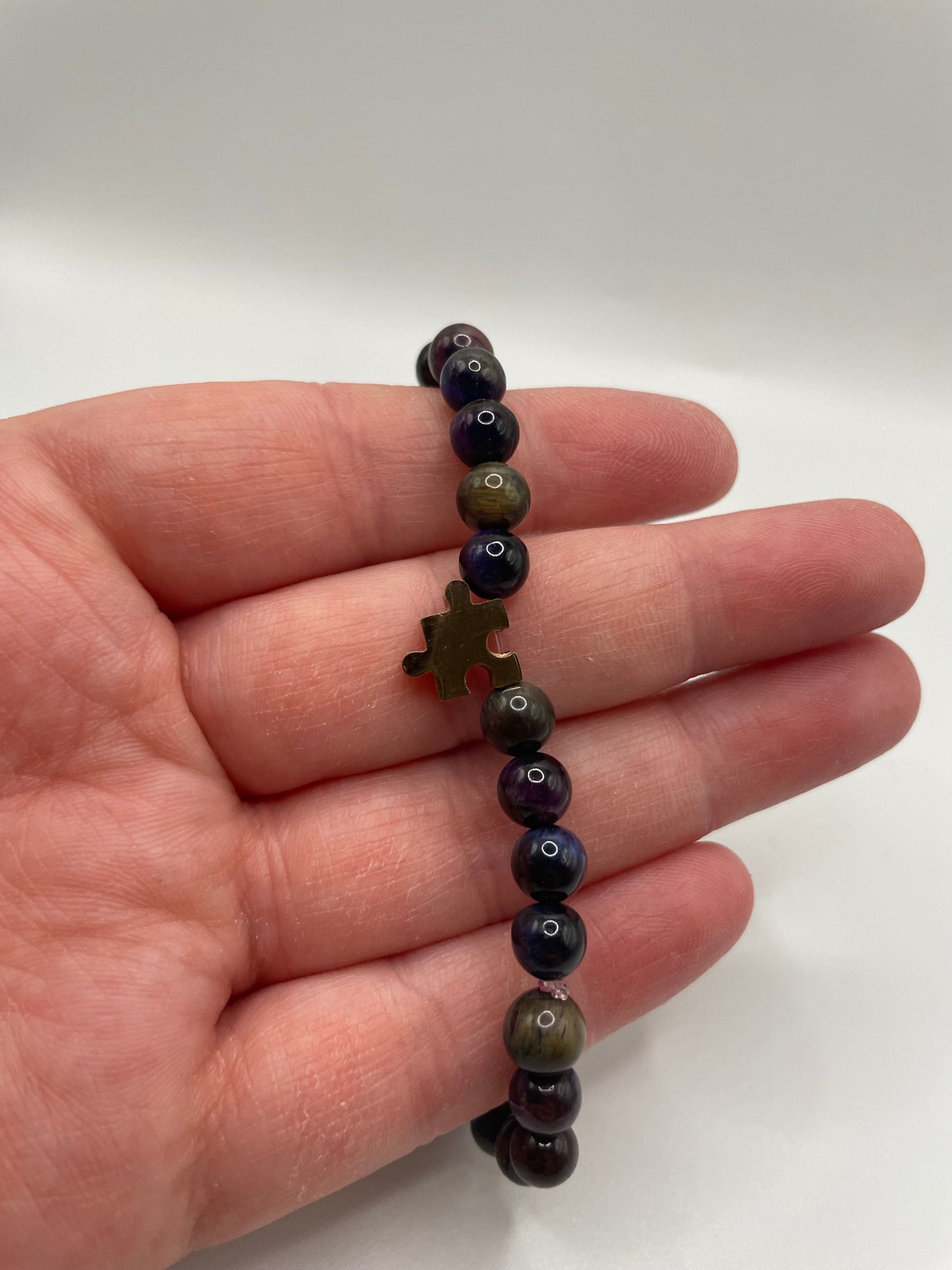Beaded Bracelet with Rose Gold Puzzle Charm