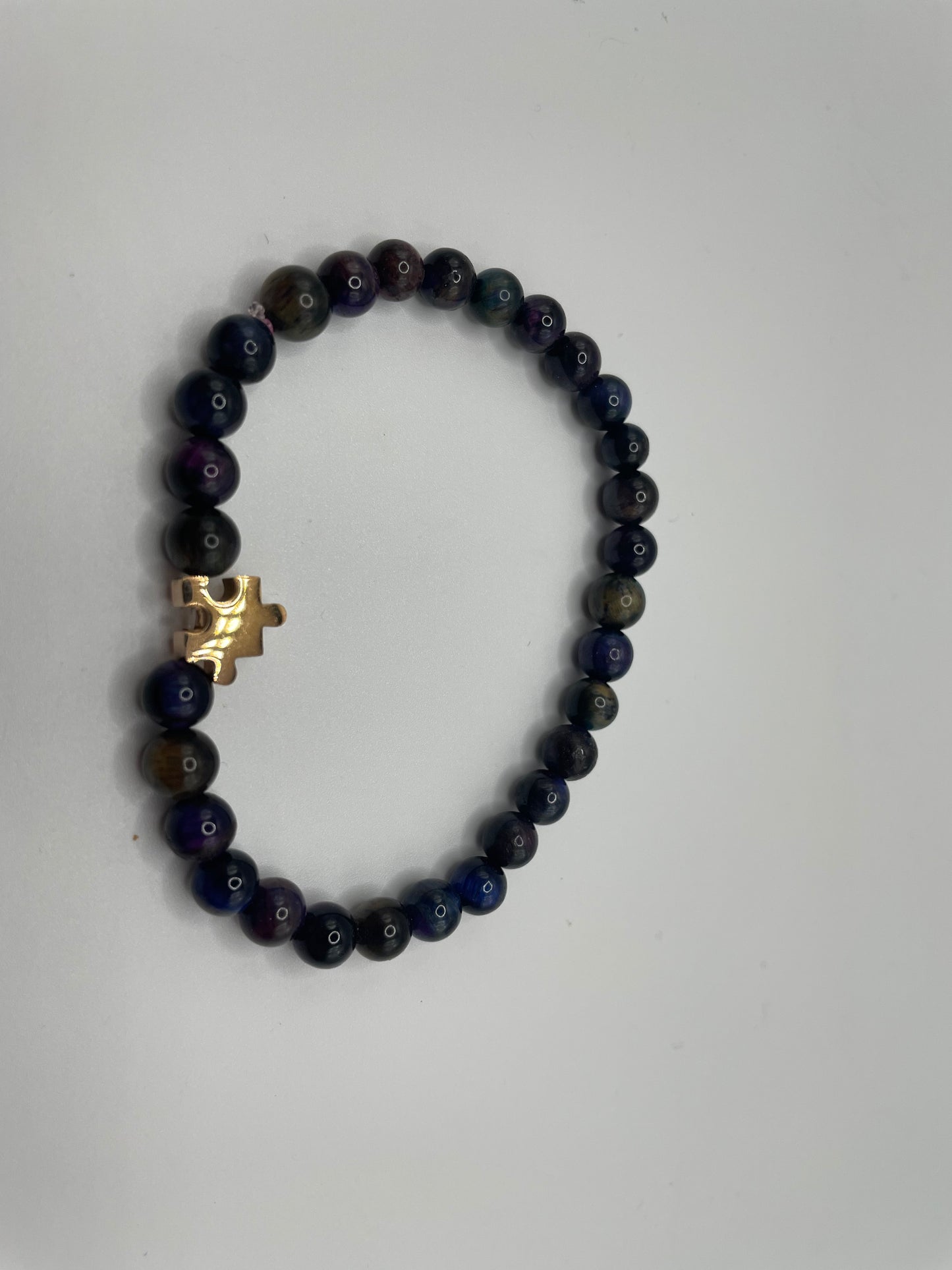 Beaded Bracelet with Rose Gold Puzzle Charm