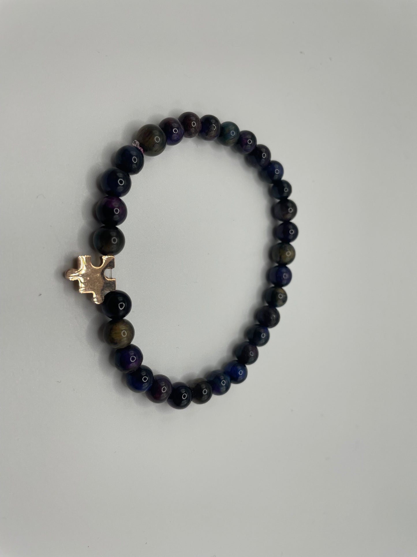 Beaded Bracelet with Rose Gold Puzzle Charm