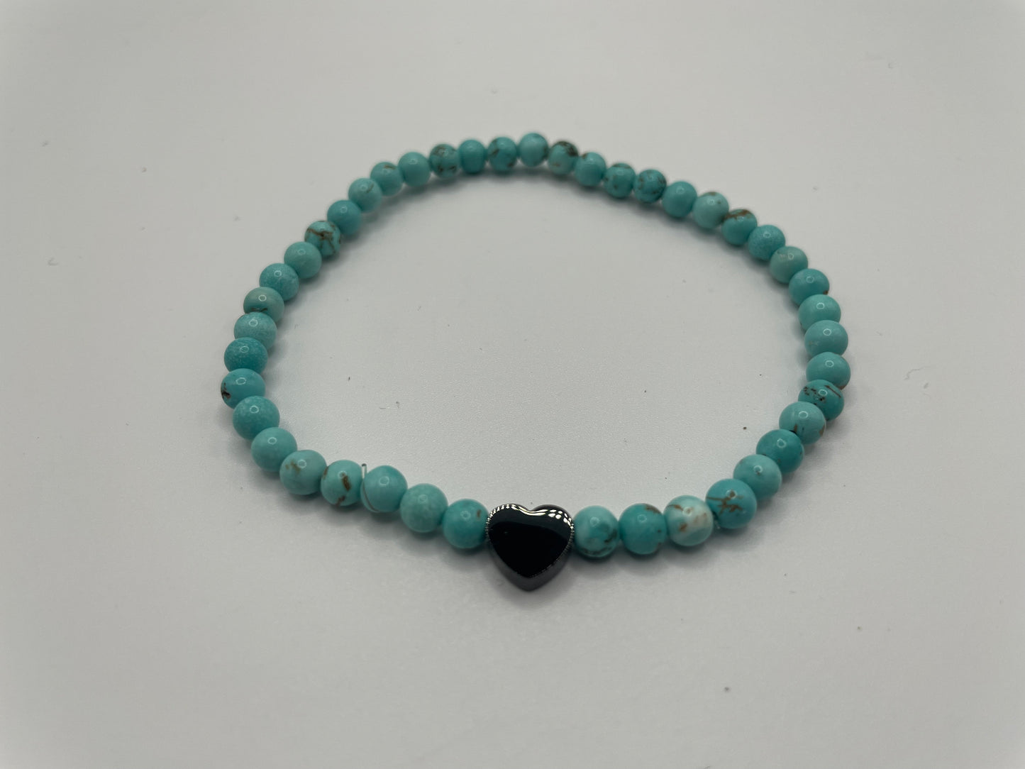Turquoise Beaded Bracelet with Black Heart Charm