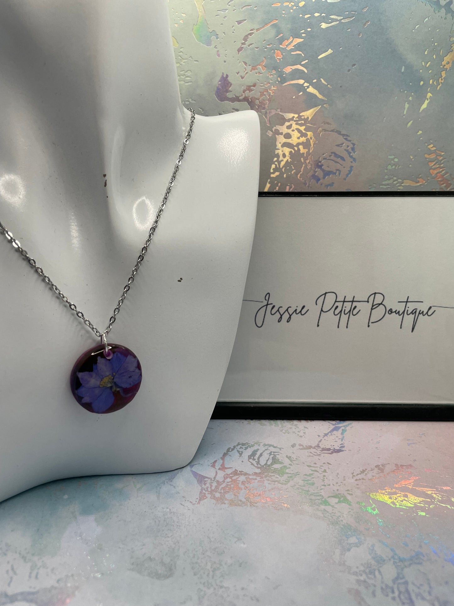 Fleur mauve sur fond rouge et mauve - 20''Acier Inoxydable