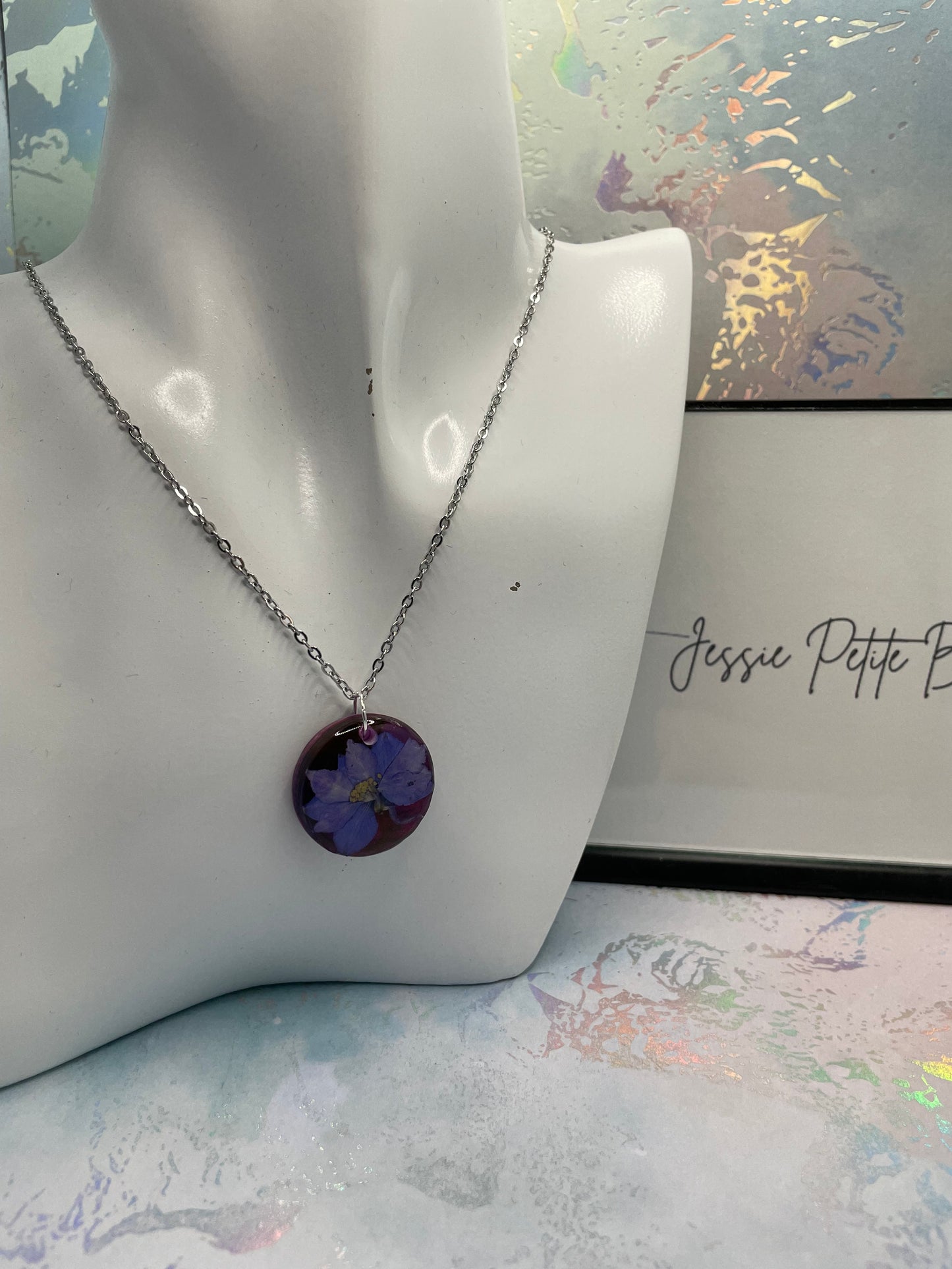 Fleur mauve sur fond rouge et mauve - 20''Acier Inoxydable