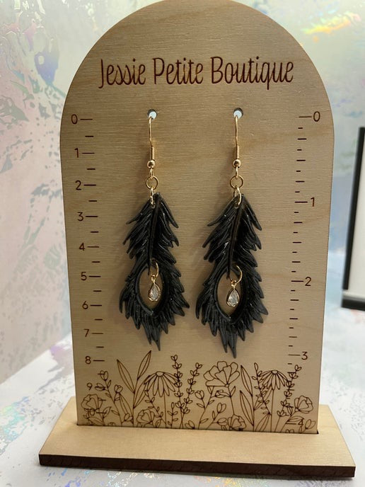 Boucles d'oreilles plumes noires avec zircones