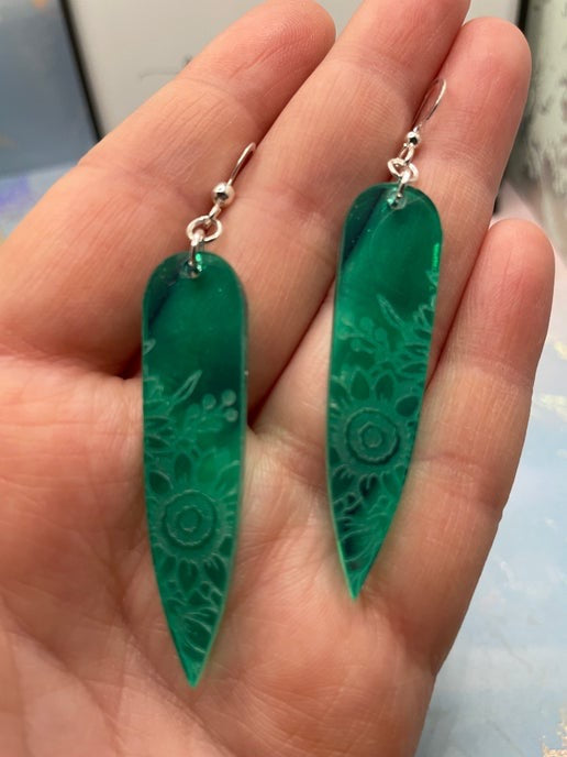 Boucles d'oreilles tournesol gravées :