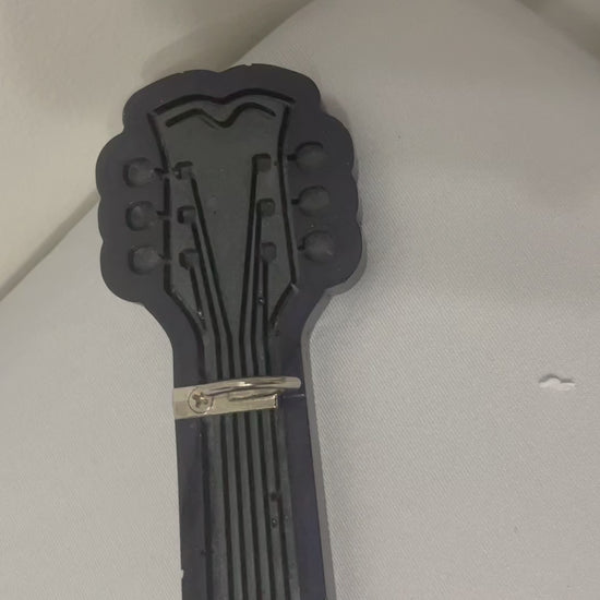navy blue and grey guitar key holder